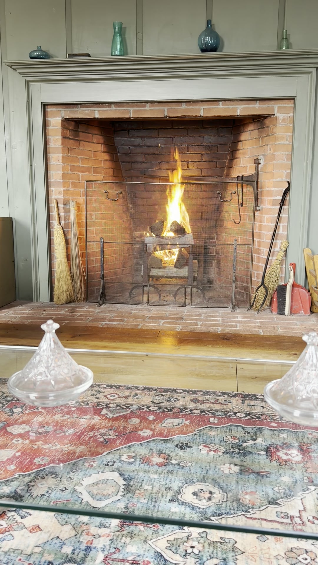 Roaring fire in the colonial fireplace
